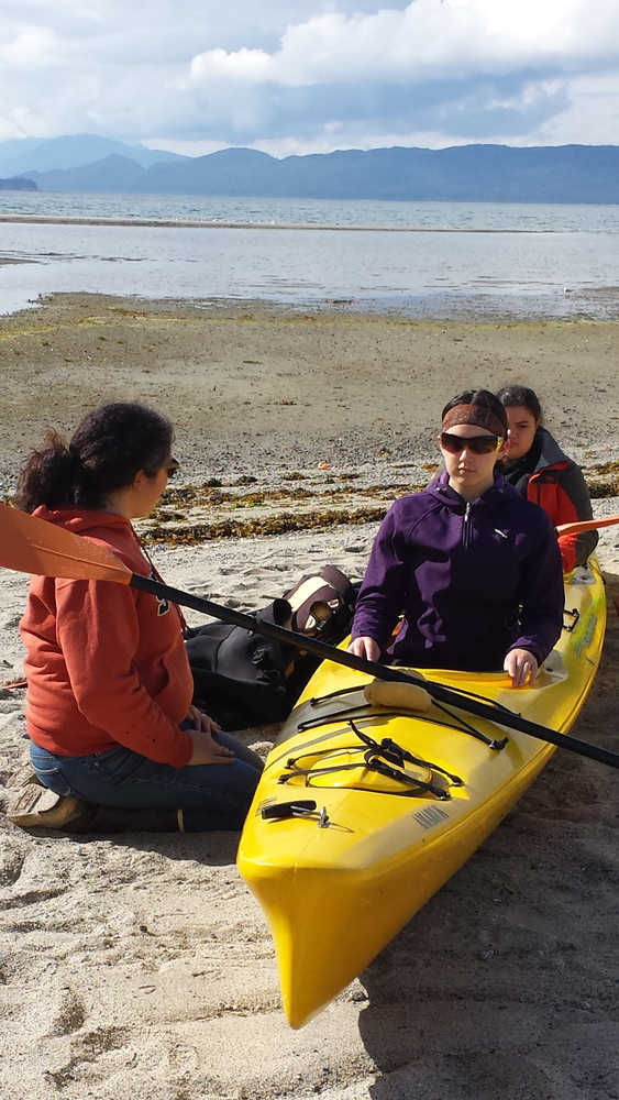 Participants in Perseverance Theatre's "Theatre in the Wild" program get comfortable in a kayak last year. The theatre is now signing up interested high school students for this year's camp, scheduled for Aug. 3 - Aug. 8.