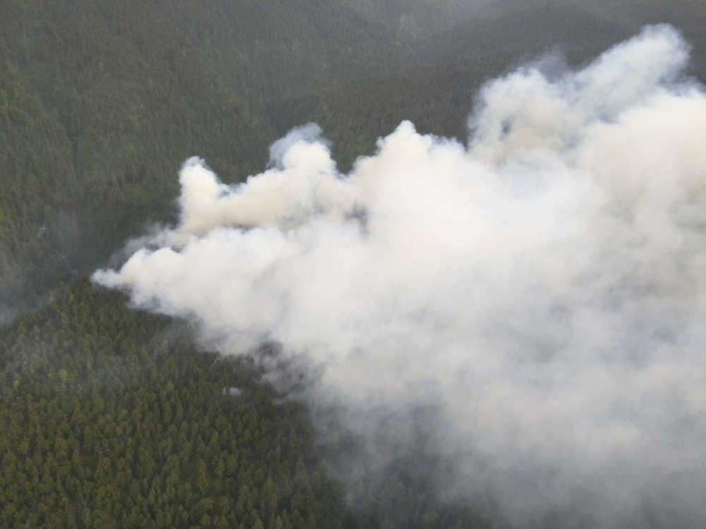 Photo courtesy/Alaska Division of Forestry A wildfire at Juneau Lake is believed to have kindled from a lightning blast on Tuesday June 16, 2015 near Cooper Landing, Alaska.