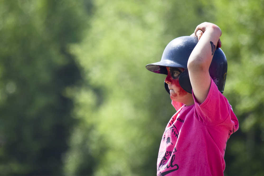 Photo by Rashah McChesney/Peninsula Clarion Andrew Love eyes a second base run on Friday June 19, 2015 during the annual World Series of Baseball event for community members with special needs in Soldotna, Alaska.
