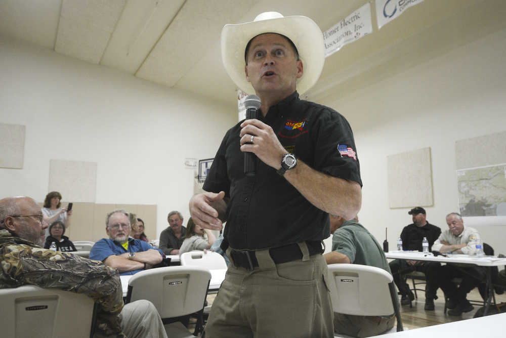 Ben Boettger/Peninsula Clarion Fire behavior analyst Stewart Turner of the Card Street wildfire response team speaks to an audience during an informational meeting at the Sterling Community Center on Sunday, June 21.