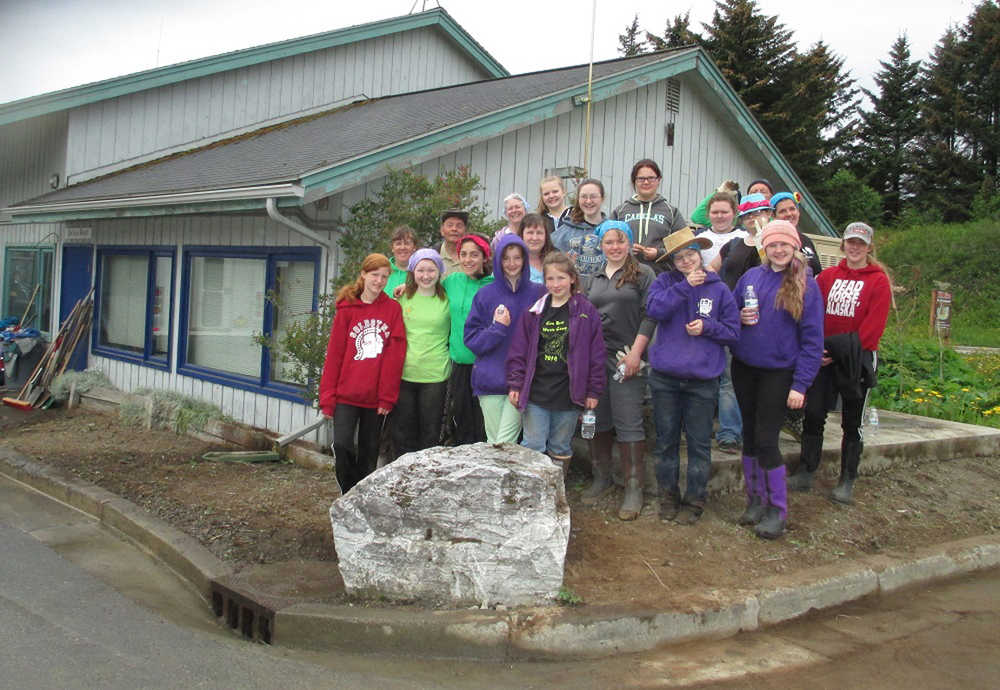 Young Women's Camp participants pose for a photo after cleaning up the area around the Seldovia Police Department building. (Submitted photo)