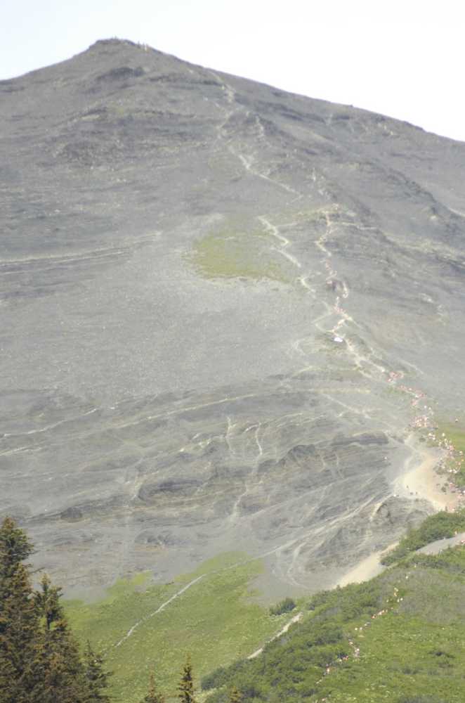 Photo by Jeff Helminiak Women's racers stream up Mount Marathon during the race in 2014. With international mountain-running stars in the field Saturday, focus will be on the mountain like never before.