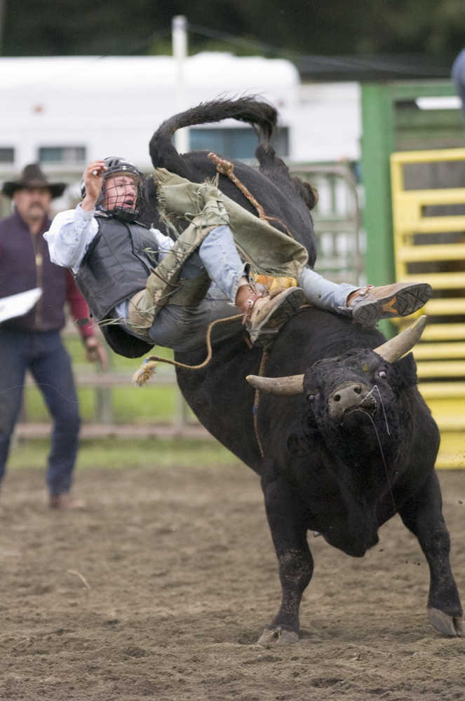 Clarion file photoIn this July 25, 2009 file photo Colten Jensen and Grim Reaper go their separate way during the bull riding event  at the Progress Days rodeo.