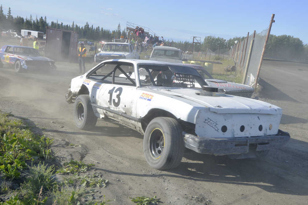 Photo by Ben Boettger/Peninsula Clarion Dean Scroggins takes to the track for some A-Stock racing Saturday night at Twin City Raceway.