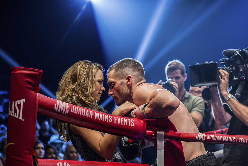 This photo provided by The Weinstein Company shows, Rachel McAdams, left, as Maureen Hope and Jake Gyllenhaal as Billy Hope, in the film, "Southpaw."  The movie releases in the U.S. on July 24, 2015. (Scott Garfield/The Weinstein Company via AP)
