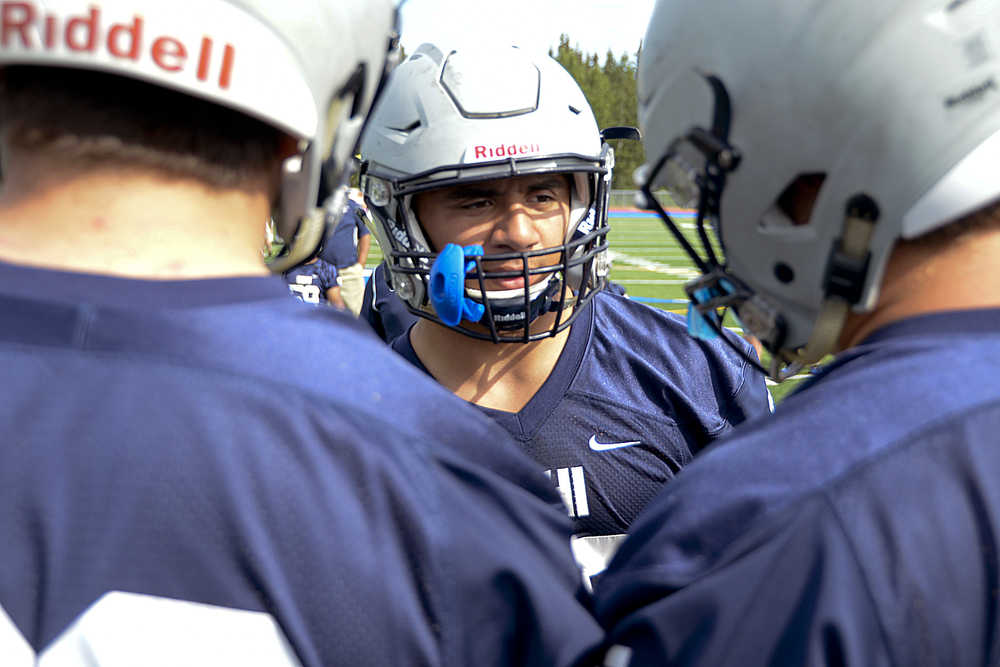 Photo by Rashah McChesney/Peninsula Clarion Soldotna High School running back Drew Gibbs calls plays for the Stars football team during their Thursday August 13, 2015 practice in Soldotna, Alaska.