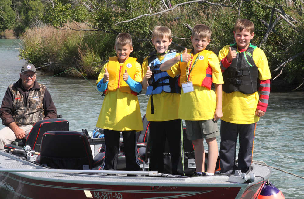 Military kids catch fish during 9th Annual Kenai River Jr. Classic