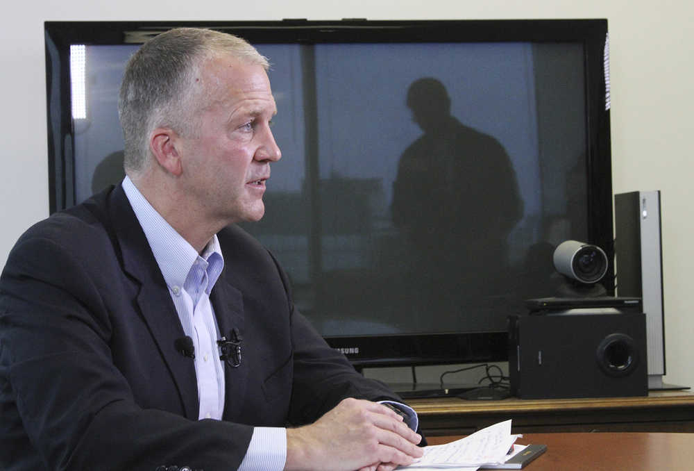 U.S. Sen. Dan Sullivan, R-Alaska, speaks during a news conference, Monday, Aug. 17, 2015, in Anchorage, Alaska. Sullivan discussed a range of topics, including the importance of an Arctic policy for the United States. (AP Photo/Mark Thiessen)