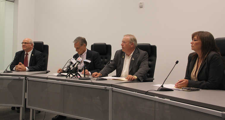 Photo by Elwood Brehmer/Alaska Journal of Commerce Sens. John Coghill and Kevin Meyer, House Speaker Mike Chenault and Rep. Charisse Millett appear at a press conference in Anchorage Tuesday.