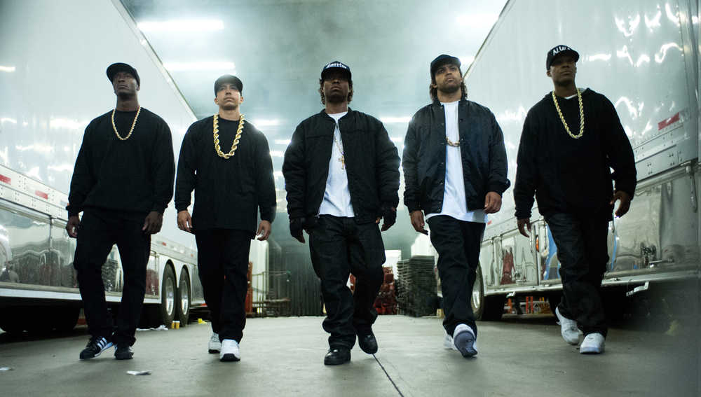 This photo provided by Universal Pictures shows, Aldis Hodge, from left, as MC Ren, Neil Brown, Jr. as DJ Yella, Jason Mitchell as Eazy-E, O'Shea Jackson, Jr. as Ice Cube and Corey Hawkins as Dr. Dre, in the film, "Straight Outta Compton." The movie releases in U.S. theaters on Aug. 14, 2015. (Jaimie Trueblood/Universal Pictures via AP)