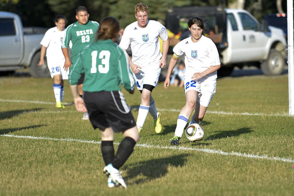 Photo by Rashah McChesney/Peninsula Clarion  Cook Inlet Academy's Kate Zimmerman guards her goal during a game against Delta Junction on Thursday August 20, 2015 in Kenai, Alaska.