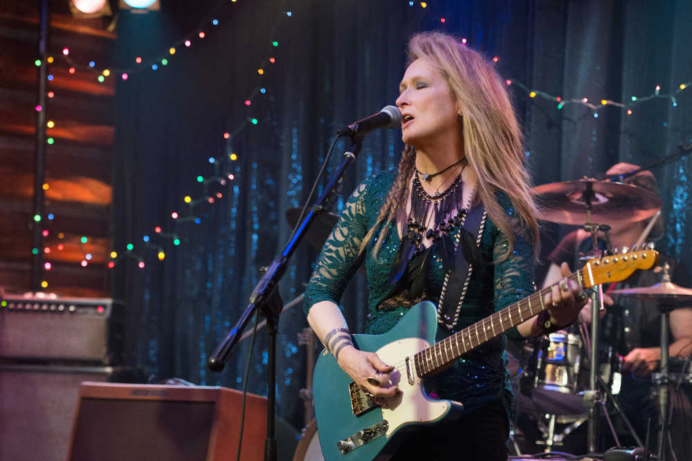 This photo provided by courtesy of Sony Pictures shows, Meryl Streep, as Ricki, performing at the Flash at the Salt Well in TriStar Pictures' "Ricki and the Flash." The movie opens in U.S. theaters on Aug. 7, 2015. (Bob Vergara/Sony Pictures via AP)