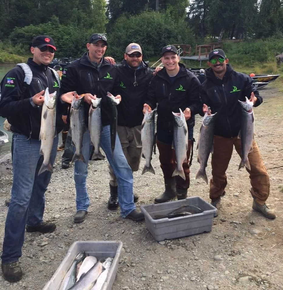 Participants in the Kenai River Foundation's Wounded Heroes Event show off their catches. (Submitted photo)