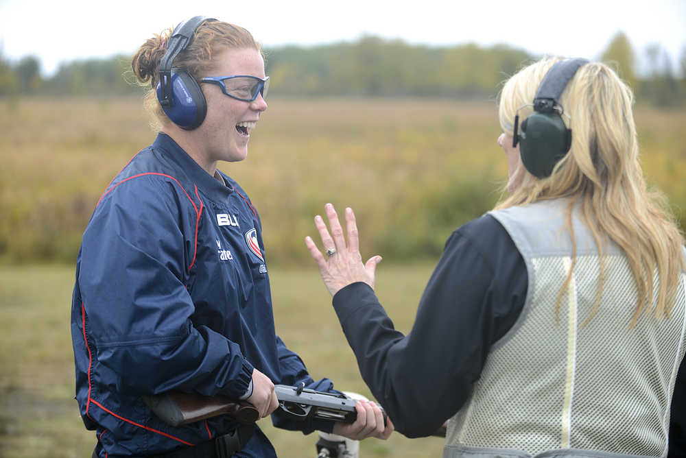 Photo by Rashah McChesney/Peninsula Clarion  Members of the U.S. Olympic women's rugby team learn to shoot with Kenai Peninsula instructors Ted and Elaina Spraker on Tuesday Sept. 8, 2015 at the Snowshoe Gun Club in Kenai, Alaska.
