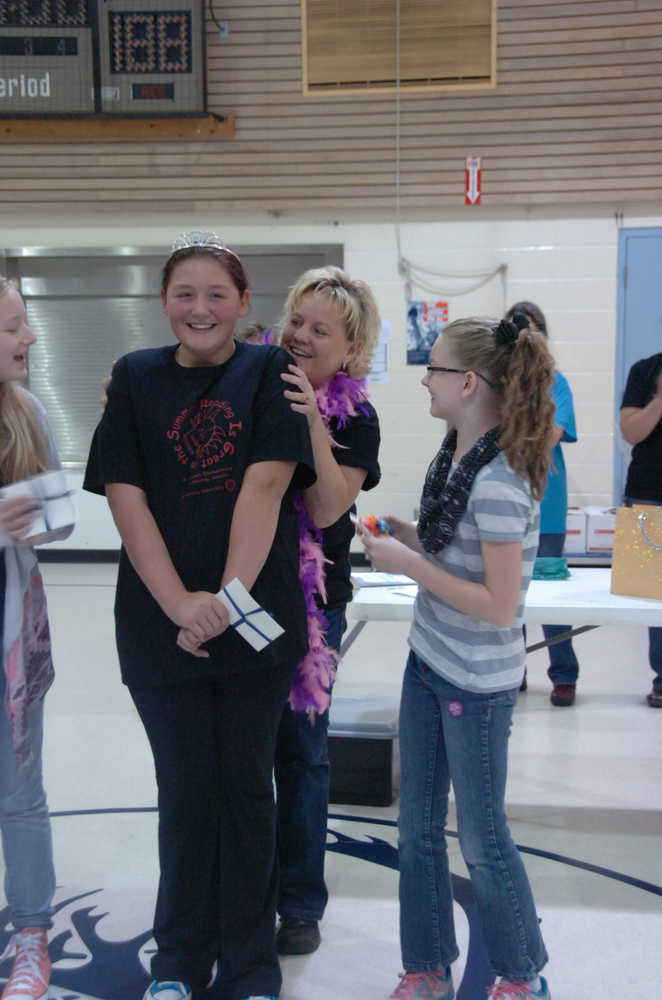 Photo by Megan Pacer/Peninsula Clarion Sixth grade student Kaytlyn Walden is crowned the new Queen of Reading for having read the most over the summer during a RIGS assembly on Friday, Sept. 18, 2015 at Kalifornski Beach Elementary in Soldotna, Alaska.