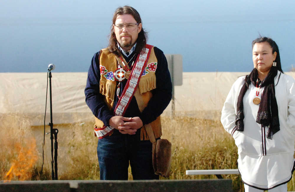 Kenaitze tribe member Jon Harris (left) and Tribal Doctor Estelle Thomson stand in front of the fire pit at the Dena'ina Wellness Center's new ceremonial area Ggugguyni T'uh during a dedication ceremony on Saturday, Sept. 19 in Kenai.