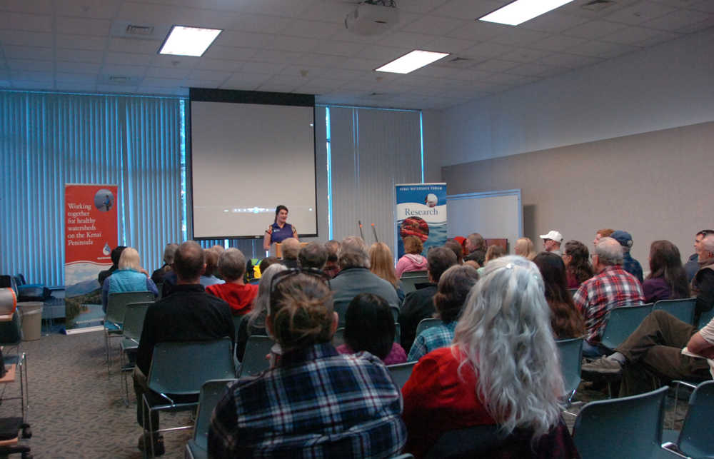 Photo by Megan Pacer/Peninsula Clarion Lisa Beranek of the Kenai Watershed Forum introduces The Lost Coast Presentation, during which listeners learned what it takes to survive a week-long bike trip, on Thursday, Sept. 24, 2015, at the Kenai River Center in Soldotna, Alaska.