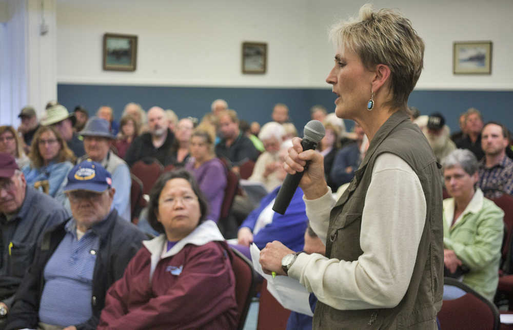 Photo by Rashah McChesney/Peninsula Clarion In this June 4, 2015 file photo Nikiski resident and activist Ann Krogseng speaks to a crowd during a borough assembly hearing on a proposed law enforcement service area in Nikiski, Alaska. Korgseng died in an ATV rollover accident at her property on Thursday.