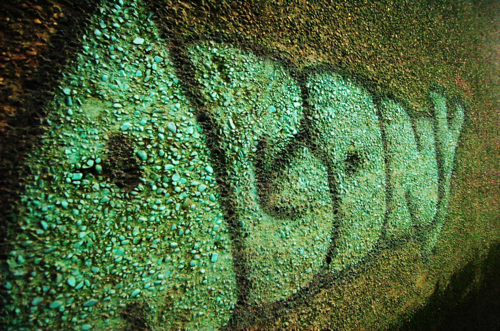 Ben Boettger/Peninsula Clarion This Sept. 25 photo shows the word "Agony" spray-painted on a cement pylon beneath the Warren Ames Memorial Bridge in Kenai.