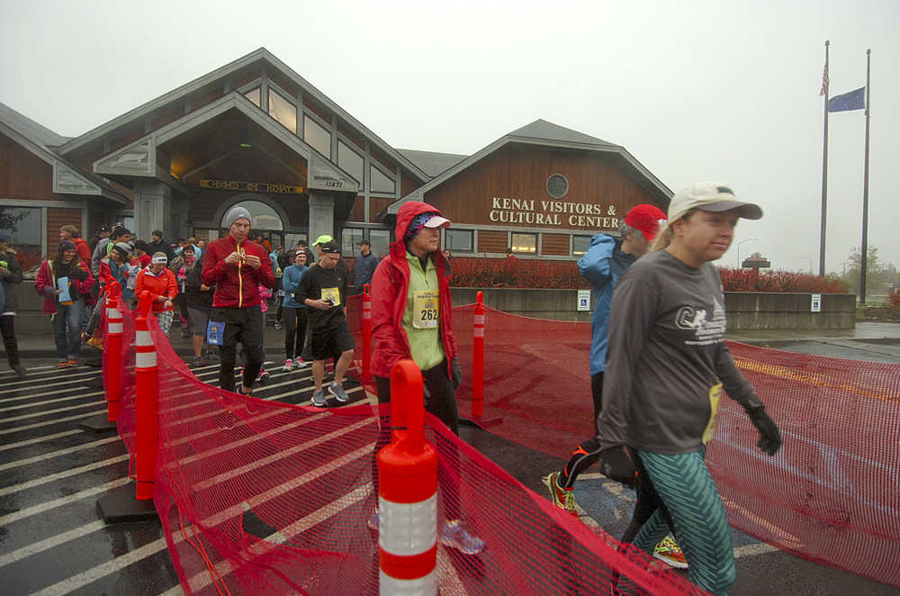 Photo by Megan Pacer/Peninsula Clarion Runners make their way to the starting line before the annual Kenai River Marathon on Sunday, Sept. 27, 2015 at the Kenai Chamber of Commerce and Visitor Center in Kenai, Alaska.