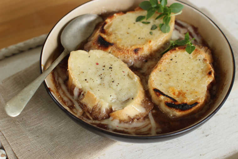 This Sept. 14, 2015 photo shows grilled French onion soup in Concord, N.H. This dish is from a recipe by Elizabeth Karmel. This fall, get French onion soup off the stove, and onto a grill. (AP Photo/Matthew Mead)