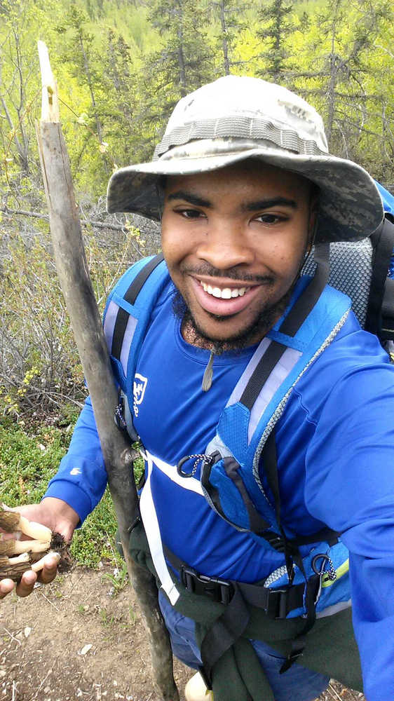 William Moore III, with a handful of morels found during a nature walk, worked as a Student Conservation Association volunteer at the Kenai National Wildlife Refuge.  (Photo by William Moore III)