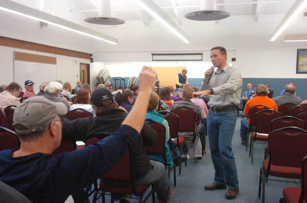 Photo by Megan Pacer/Peninsula Clarion Ben Carpenter, a prospective board member for a Nikiski Law Emforcement Service Area, takes questions during a community meeting on Wednesday, Sept. 30, 2015, at the Nikiski Community Recreation Center in Nikiski, Alaska. Proposition 4 asks voters to approve the service area as well as a five-person board to oversee its direction.