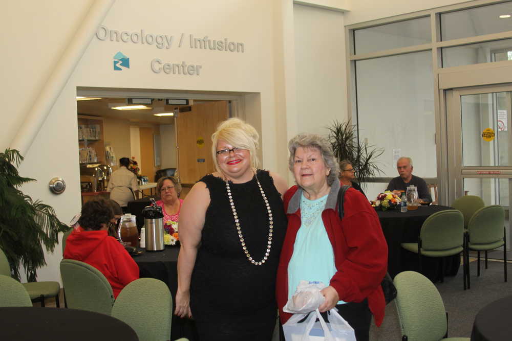 Jennifer Bostelman welcomes patients to the Central Peninsula Hospital Peninsula Radiation Oncology Center appreciation luncheon.