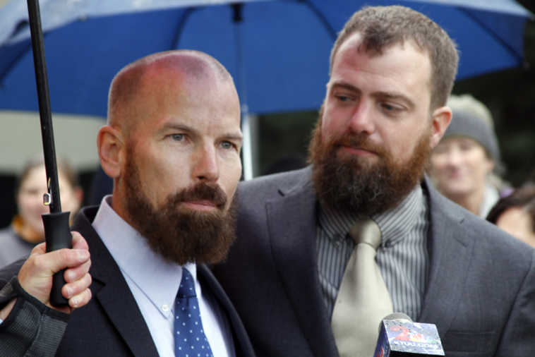 FILE -- This Oct. 10, 2014, file photo shows Matthew Hamby, left, and his husband, Christopher Shelden, speaking during a news conference in Anchorage, Alaska. The couple were among five that challenged Alaska's ban on same-sex marriages, which was struck down Oct. 12, 2014. The state health department on Monday, Oct. 12, 2015, said nearly 285 same-sex couples have married in Alaska in the last year, a fraction of the 5,589 total marriages in Alaska in the last year. Hamby said during that time, "mundane tasks," such as filing a house deed, have gotten a bit easier. (AP Photo/Mark Thiessen)