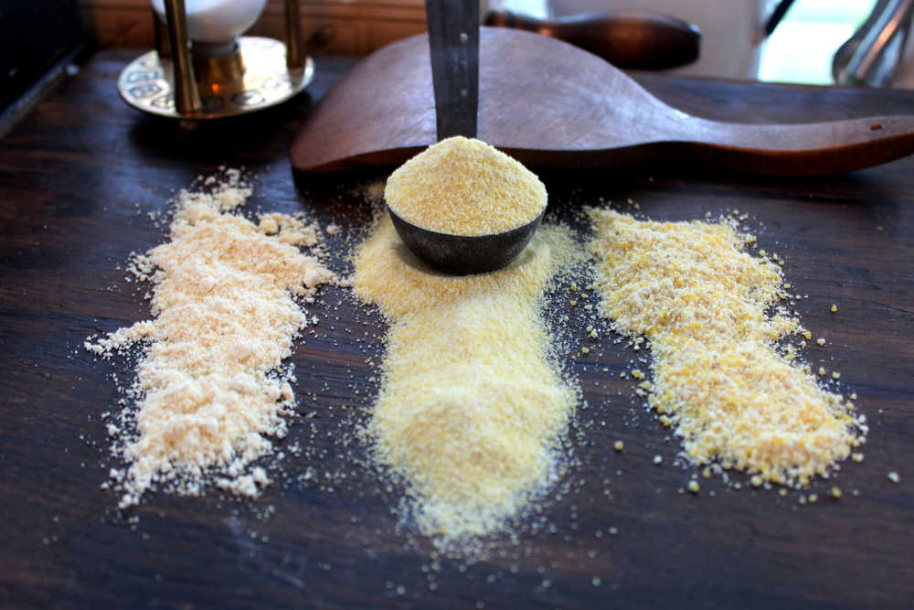 : Cornmeal can be found in a variety of "grinds," fine, medium and coarse, which has been either stone-ground (right), or made through a steel roller process (left and center).  Finely ground cornmeal can look like flour, while coarse stone-ground cornmeal, usually with the hull and germ of the corn kernel left in, looks less refined and processed. (Coarse cornmeal will take longer to cook.) If a recipe does not specify what kind of cornmeal to use, choose medium-grind cornmeal.