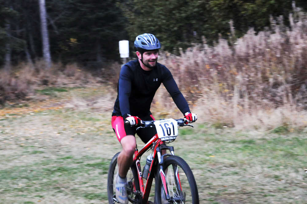 Tony Eskelin struggles up one of the steep hills on the Tsalteshi Trails during the Chainwreck Cyclocross event Oct. 8.