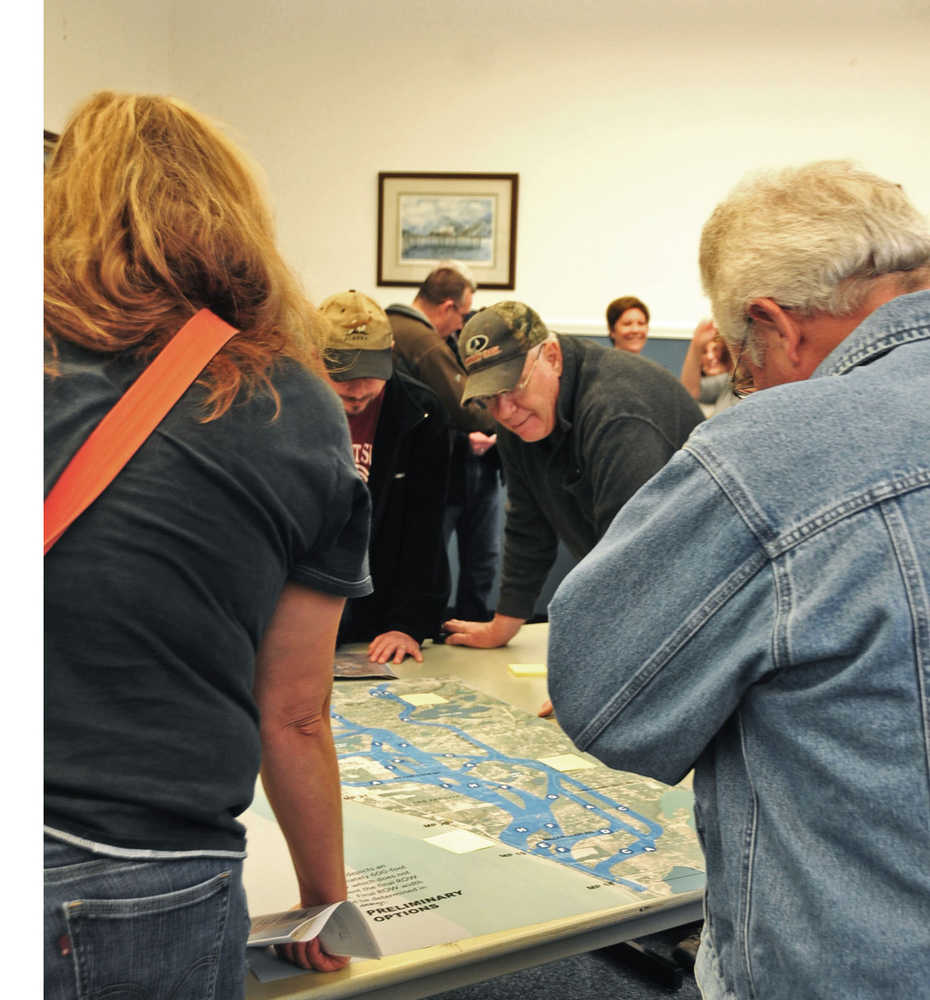 Nikiski residents gathered at the Nikiski Recreational Center Monday to examine the options for the relocation of the Kenai Spur Highway around the proposed Alaska LNG facility.