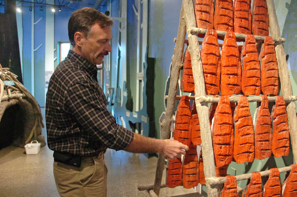 Photo by Megan Pacer/Peninsula Clarion Alaska Refuge Information Technician Program Coordinator Kevin Painter explains the goals behind the design of an exhibit in the Kenai National Wildlife Refuge Visitor Center during a workshop for the program on Wednesday, Oct. 21, 2015 at the center in Soldotna, Alaska.