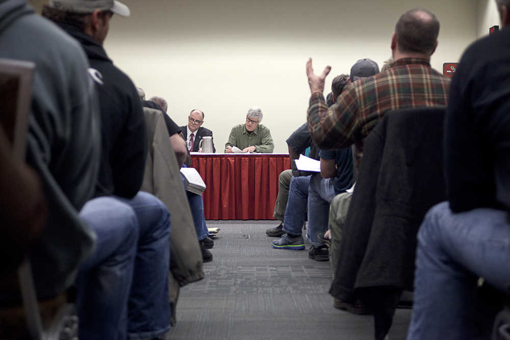 Photo by Rashah McChesney/Peninsula Clarion In this Feb. 6, 2014 file photo  Alaska Board of Fisheries members John Jensen and Tom Kluberton hear committee testimony during the triennial Upper Cook Inlet meeting Thursday Feb. 6, 2014 in Anchorage, Alaska. Kluberton, now the board's chairperson, drove the board's decision to put off voting on allowing a meeting on Cook Inlet's issues to take place on the Kenai Peninsula during an Oct. 22, 2015 meeting in Anchorage. The board will again take up the issue during it's Bristol Bay meeting in December.
