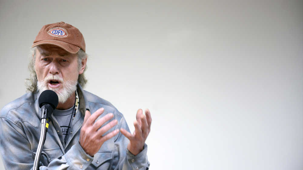 Photo by Rashah McChesney/Peninsula Clarion Kasilof resident Steve Schoonmaker recites a poem during the fifth annual gathering of fisher poets on Thursday Oct. 22, 2015 in Soldotna, Alaska.