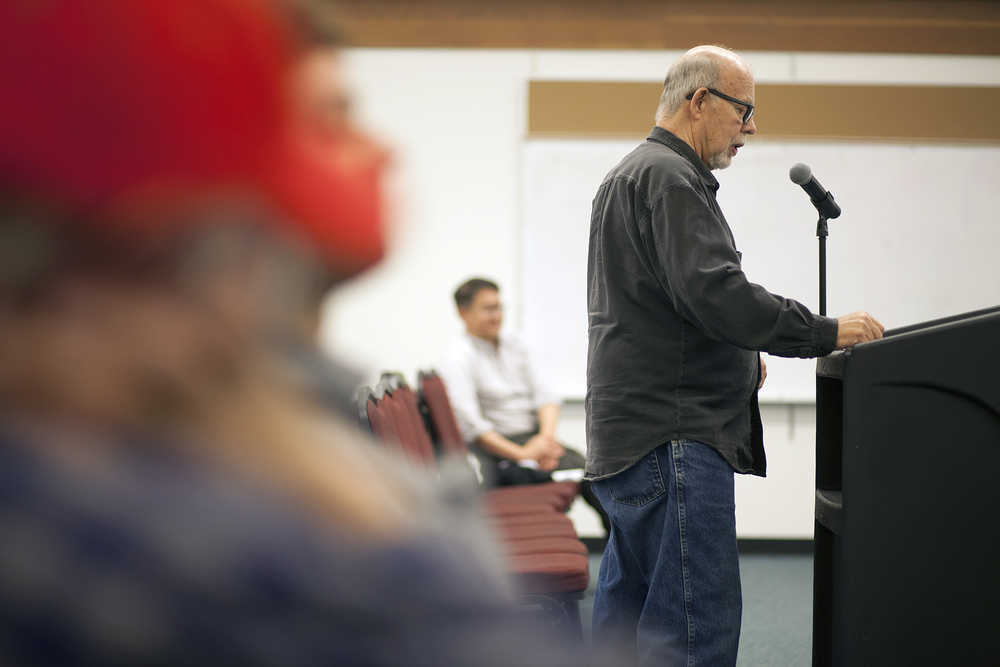 Photo by Rashah McChesney/Peninsula Clarion Nikiski resident Bill Warren gives comments to members of the Federal Energy Regulatory Committee during a meeting on the Alaska LNG project on Tuesday Oct. 27, 2015 in Nikiski, Alaska. Warren said his home on the bluff was sited less than 1,000 feet from one of the gates of the proposed LNG terminal, yet no one had contacted him about the project.