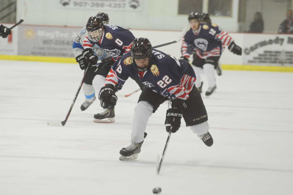 Photo by Kelly Sullivan/ Peninsula Clarion In this Nov. 21, 2014 file photo the Kenai River Brown Bears control the puck in a game Wenatchee Wild at the Soldotna Regional Sports Complex in Soldotna, Alaska.