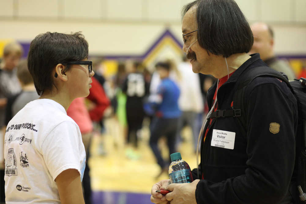 Photo by Kelly Sullivan/ Peninsula Clarion Cheyenne Juliussen thanks Michael Patterson for coming to her school Wednesday, Oct. 28, 2015, at Kenai Middle School in Kenai, Alaska.