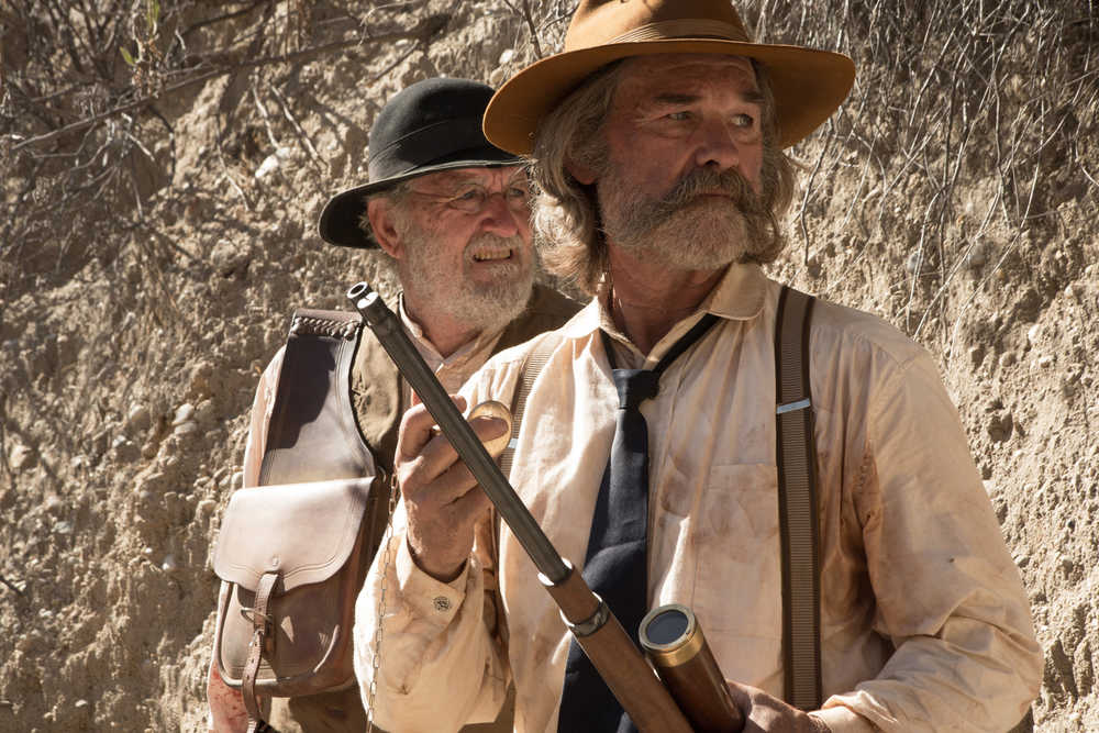 This photo provided by Twilight Riders, LLC shows, Richard Jenkins, left, as Chicory and Kurt Russell as Sheriff Franklin Hunt in the western film "Bone Tomahawk," an RLJ Entertainment release. The movie opens in U.S. theaters Friday, Oct. 23, 2015. (Scott Everett White/Twilight Riders, LLC via AP)
