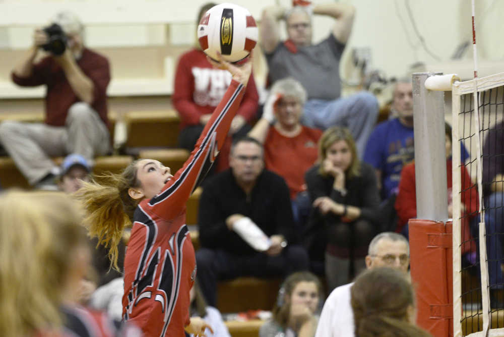 Ben Boettger/Peninsula Clarion Kenai volleyball player Alexis Baker hits the ball over the net during a game against Wasilla on Friday Nov. 6 at Kenai Central High School.