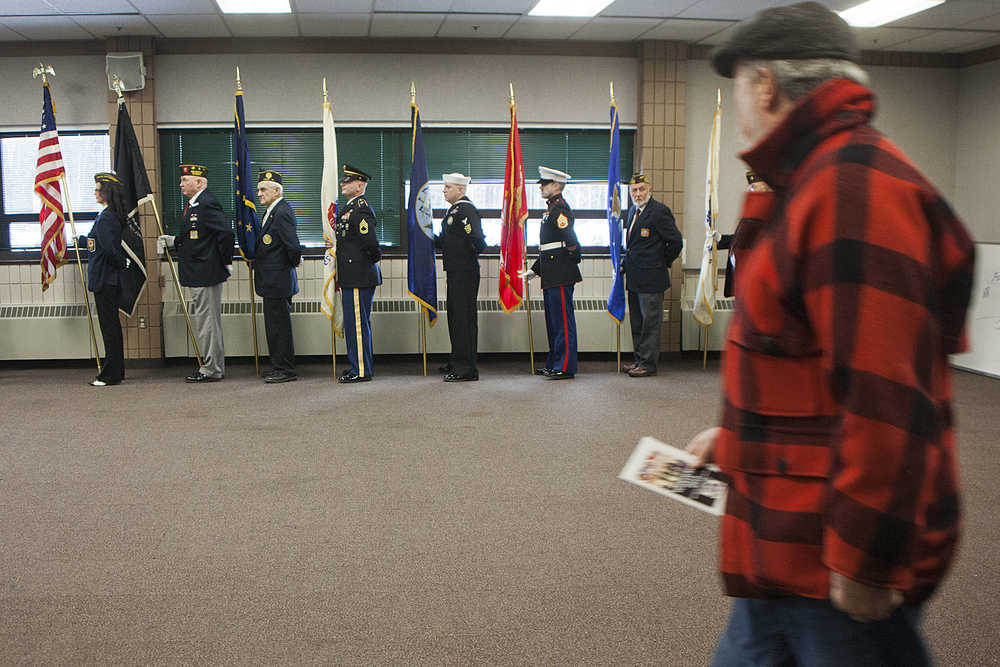 Photo by Rashah McChesney/Peninsula Clarion Lee Miller plays taps during a Veterans Day ceremony on Wednesday Nov. 11, 2015 in Soldotna, Alaska.