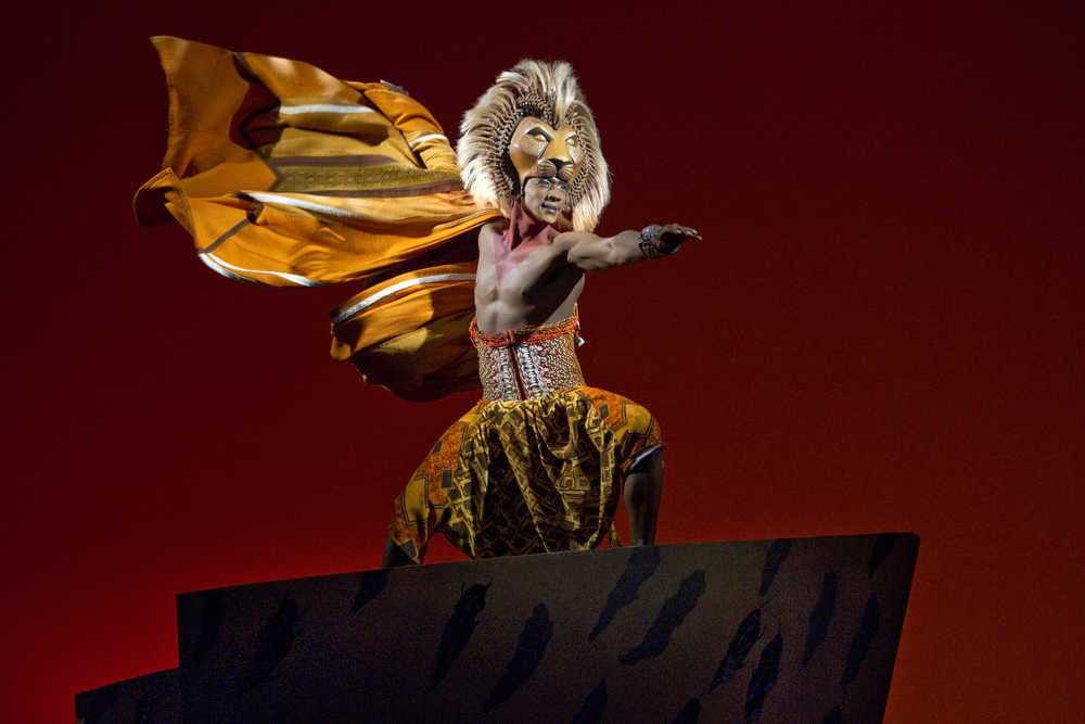 This image released by Disney Theatrical Productions shows Jelany Remy as Simba in the Broadway musical "The Lion King. The Disney stage blockbuster on Wednesday, Nov. 18, 2015, released 360-degree footage of its opening song "Circle of Life" that lets users look left, right, up, backstage and at the audience even when sitting on a couch. (Joan Marcus/ Disney Theatrical Productions via AP)