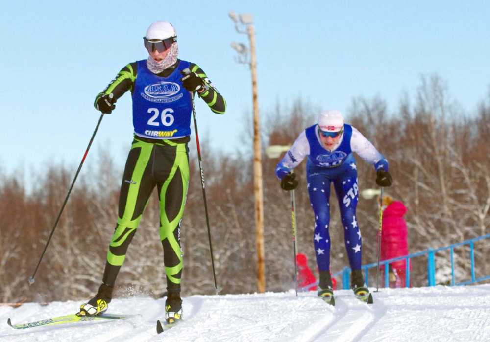 Colony's Tracen Knopp skis just ahead of Soldotna's Levi Michael during the 10-kilometer classic race of the ASAA/First National Bank State Cross-Country Ski Championships at Kincaid Park in Anchorage Friday.