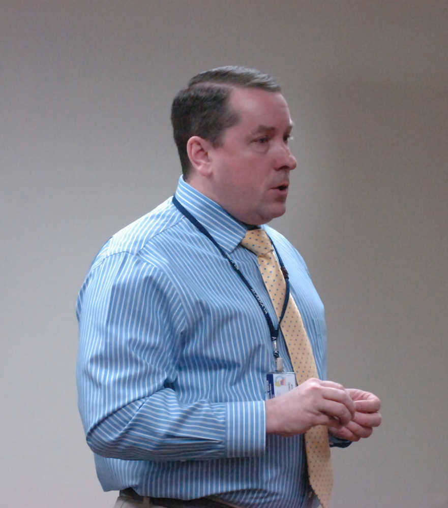 Photo by Megan Pacer/Peninsula Clarion Shawn Bransky, associate driector of the Alaska VA, addresses a room of local veterans during a session to discuss current VA issues on Friday, Nov. 20, 2015 at the McLane Commons at Kenai Peninsula College in Soldotna, Alaska.