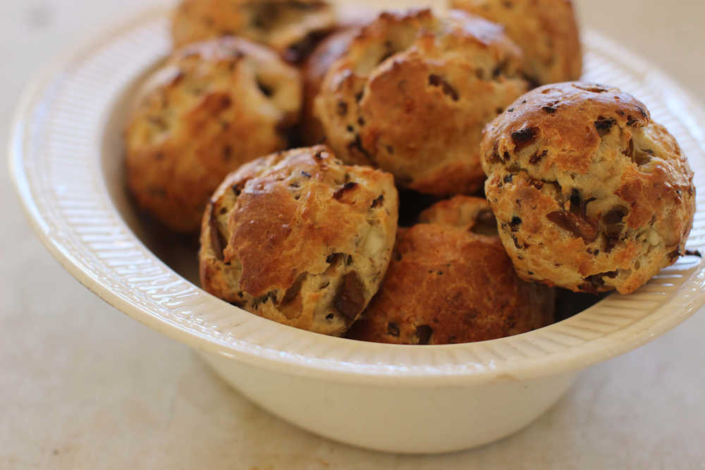 This Oct. 19, 2015 photo shows blue cheese and mushroom gougeres in Concord, N.H. If you're entertaining, you can't totally slack off. You just need to marry your need for fatty comforting carbs with something dressy enough to serve in polite company. (AP Photo/Matthew Mead)