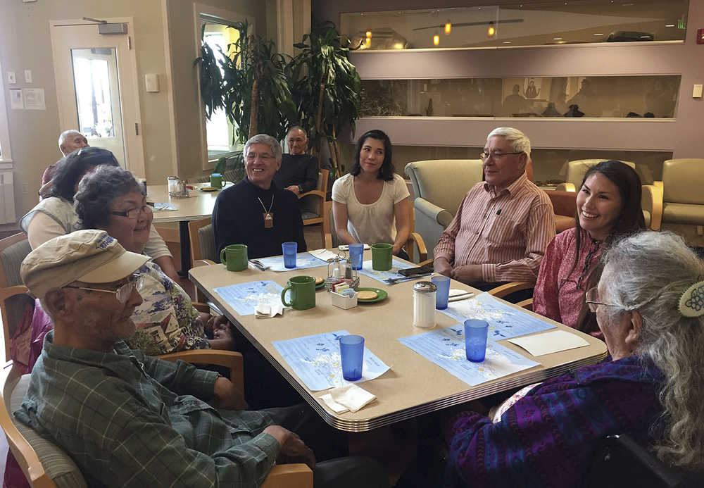 This Sept. 2, 2015 photo released by the U.S. Department of Agriculture shows diners at a long-term senior care facility in Kotzebue, Alaska. Now that the long-term senior care facility in Kotzebue just began incorporating traditional foods into the regular menu, its Alaska Native residents no longer have to just wait for monthly family potlucks to enjoy the taste of the subsistence foods they grew up with. (Sedelta Oosahwee/U.S. Department of Agriculture via AP)
