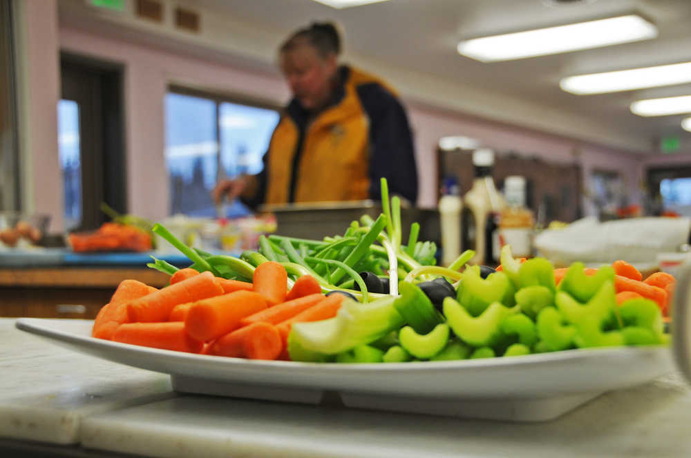 Photo by Elizabeth Earl/The Peninsula Clarion The Kenai Peninsula Food Bank's annual turkey dinner on Wednesday saw a high turnout. The food bank will be closed Thursday and Friday and reopen on Monday.