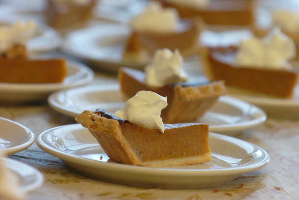 Photo by Megan Pacer/Peninsula Clarion Local residents enjoyed pumpkin pie and several other traditional treats on Thursday, Nov. 26, 2015 at the Kenai Senior Citizens Center in Kenai, Alaska.