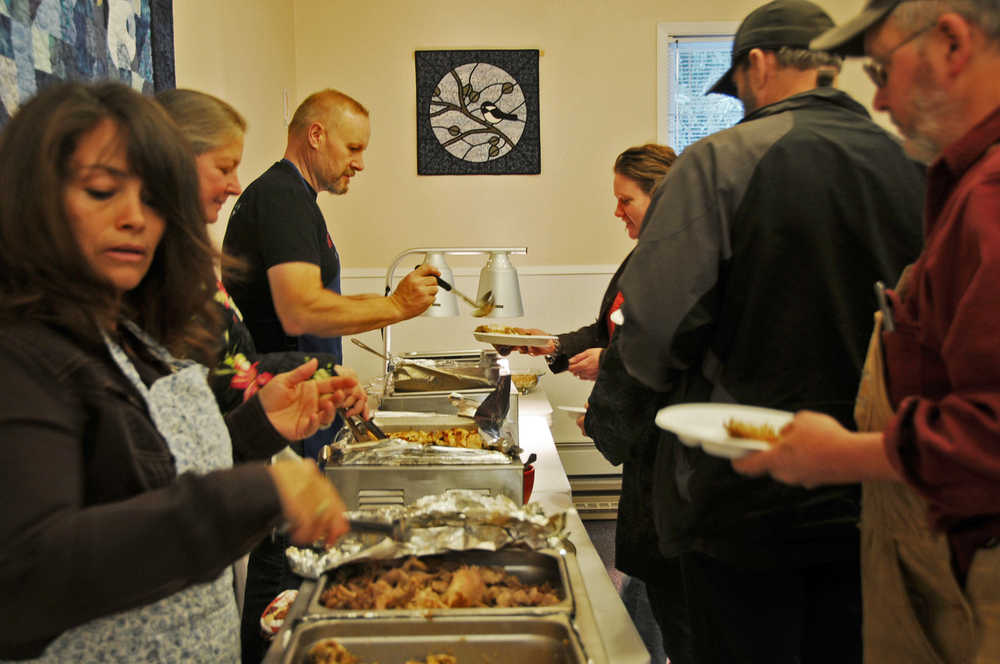 Photo by Elizabeth Earl/The Peninsula Clarion The Kasilof Community Church hosted its second annual community Thanksgiving dinner, with a variety of dishes from turkey and stuffing to smoked salmon and cheese dip.