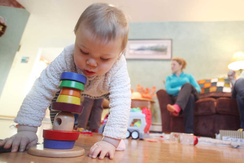 Photo by Kelly Sullivan/ Peninsula Clarion A group of Nikiski residents who are in the beginning stages of developing a parents cooperative community preschool gathered Thursday, Nov. 12, 2015, at Katy Bethune's home in Nikiski, Alaska.